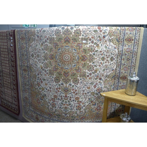 1442 - A multi-coloured ground full pile, floral patterned carpet, 200cm x 300cm