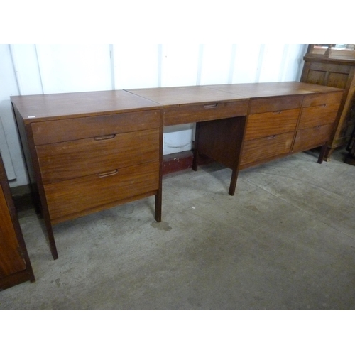 66 - A teak three piece bedroom suite, retailed by Heals of London