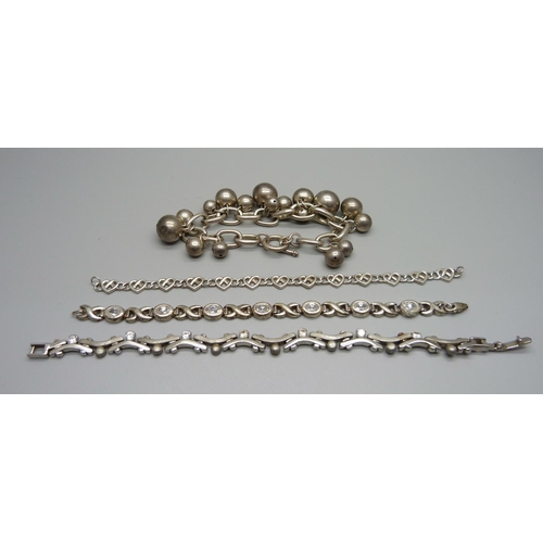 1058 - Four silver bracelets, 84g, two require new clasps