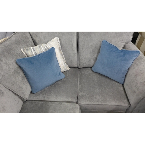 1339 - A small grey upholstered corner sofa