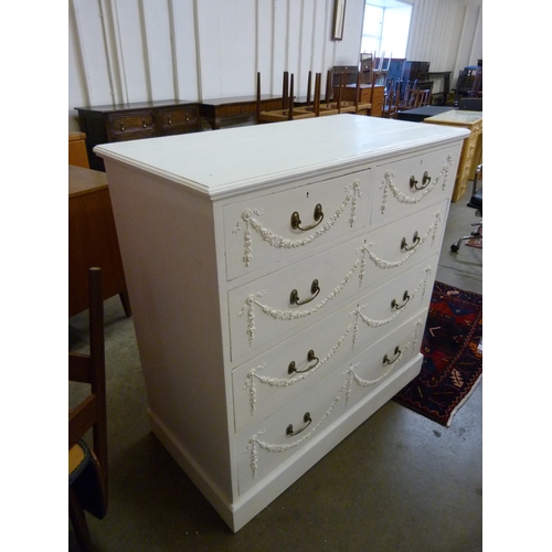 142A - A Victorian Adams style painted pine chest of drawers