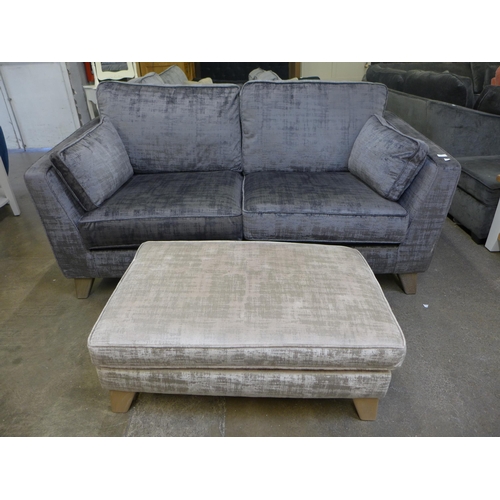 1531 - A Dolce magnesium upholstered 2.5 seater sofa and contrasting footstool