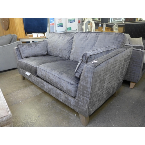 1531 - A Dolce magnesium upholstered 2.5 seater sofa and contrasting footstool