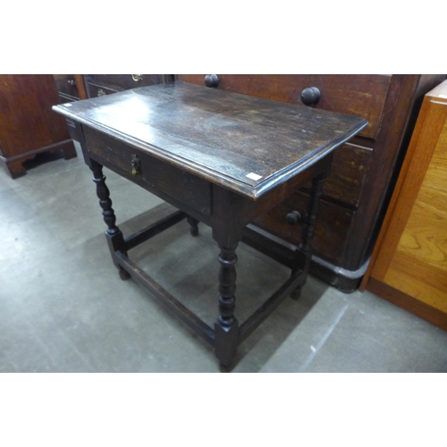 102 - A William III oak single drawer side table