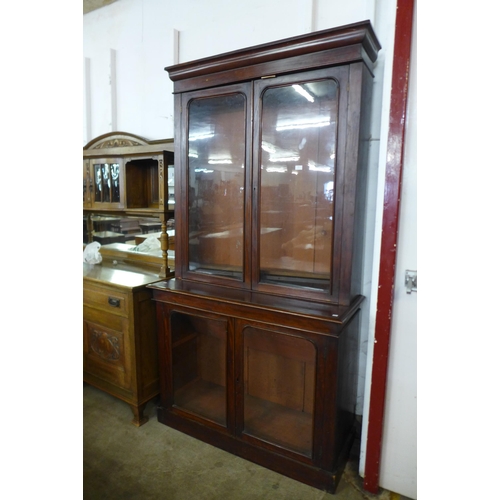 107 - A Victorian mahogany four door bookcase