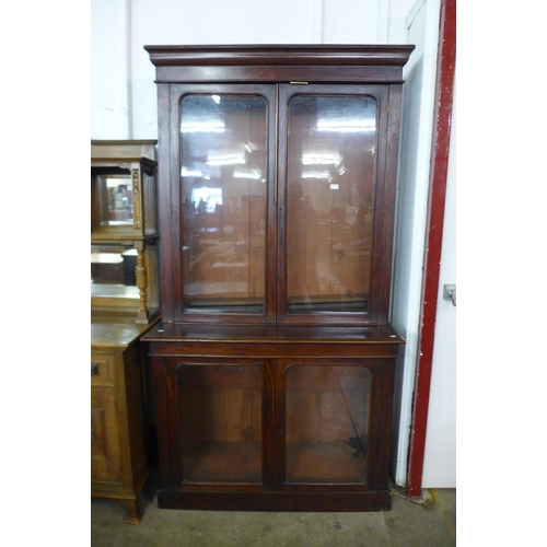 107 - A Victorian mahogany four door bookcase