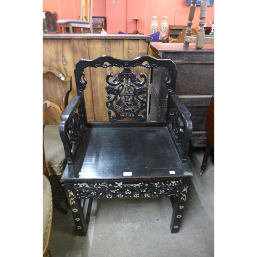 124 - A Chinese ebonised and mother of pearl inlaid armchair