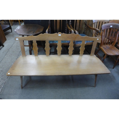 129 - A light oak hall bench