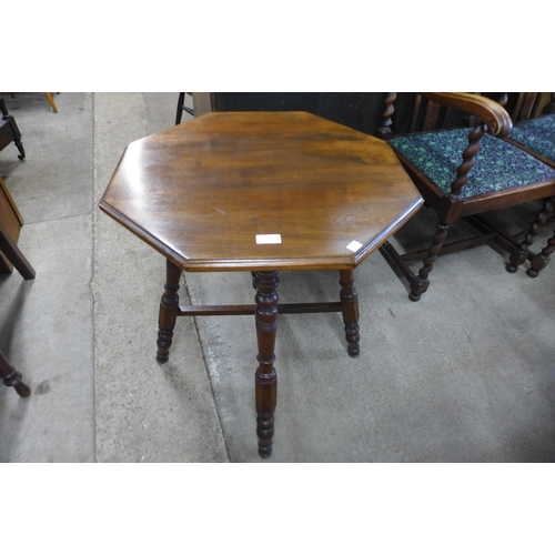 130 - A Victorian Gillows style walnut octagonal occasional table