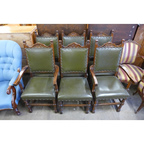 134 - A set of six oak dining chairs