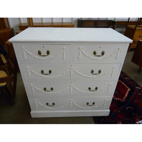 142A - A Victorian Adams style painted pine chest of drawers