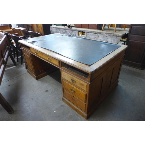 171 - A Victorian oak partner's library desk (missing two drawers)