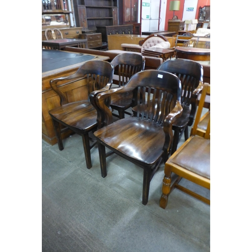 172 - A pair of hardwood Captains desk chairs