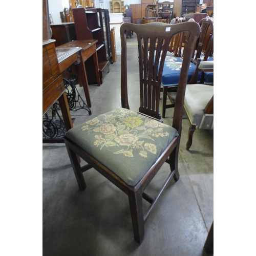 185 - A set of four George III mahogany dining chairs