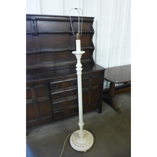 186 - A cream painted standard lamp