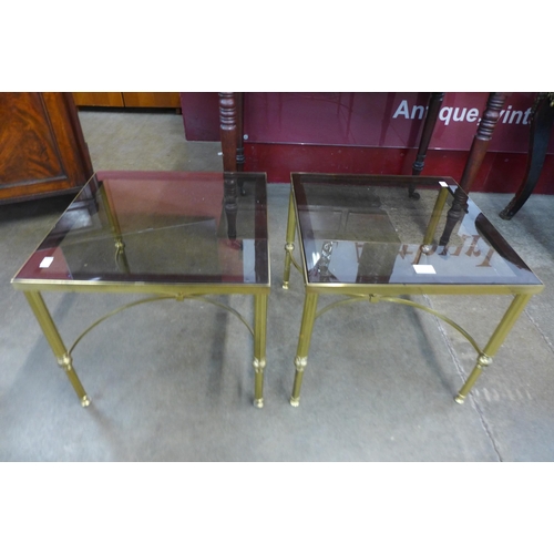 20 - A pair of Italian style brass and glass topped square coffee tables