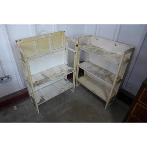 233 - A pair of painted folding bookcases