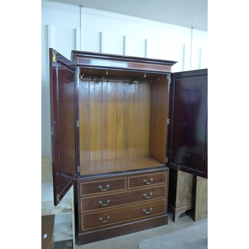 234 - An Edward VII inlaid mahogany wardrobe