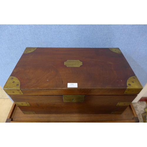 273 - A Victorian teak and brass mounted campaign writing slope