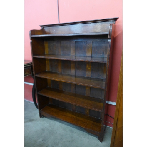 30 - An Arts and Crafts oak open bookcase