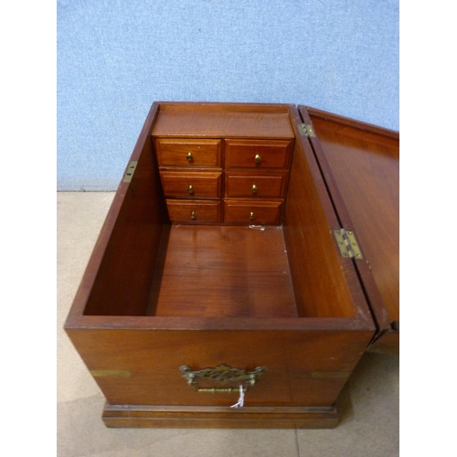 307 - A Victorian teak and brass mounted fitted box