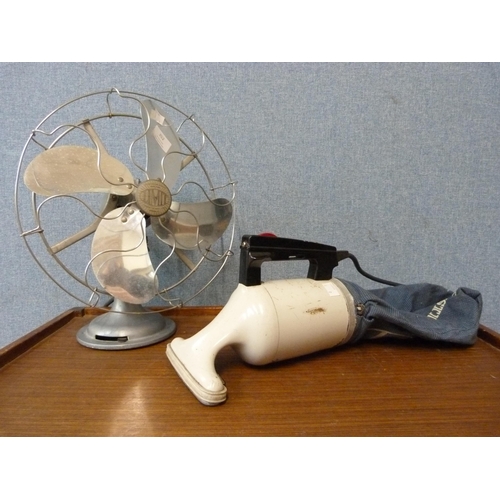 352 - A vintage Limit desk fan and a small Hoover