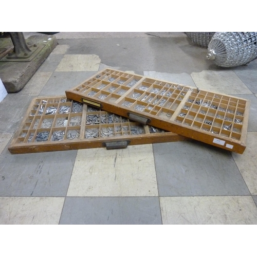 354 - Two sets of early 20th Century printer's trays with lead type