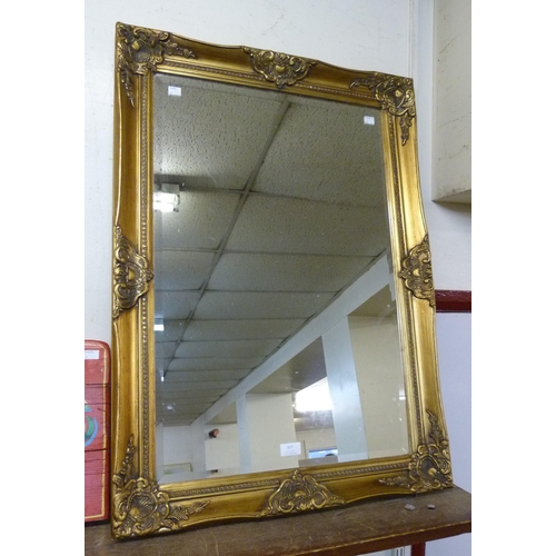 357 - A Victorian style gilt framed mirror