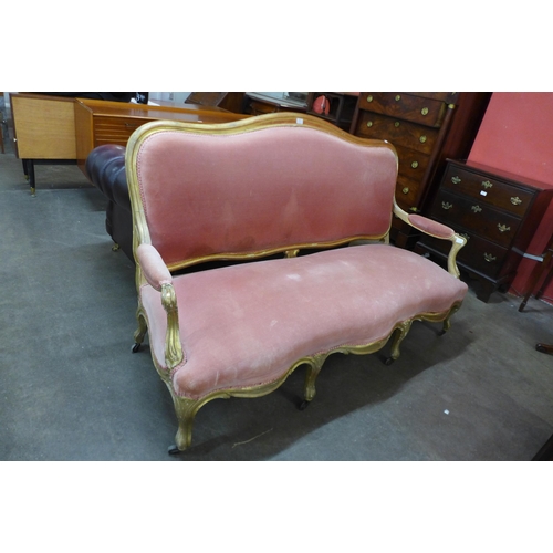 38 - A 19th Century French giltwood and pink fabric upholstered settee