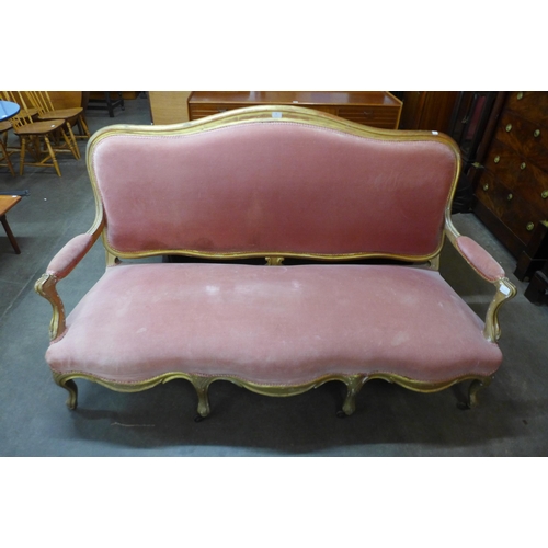 38 - A 19th Century French giltwood and pink fabric upholstered settee