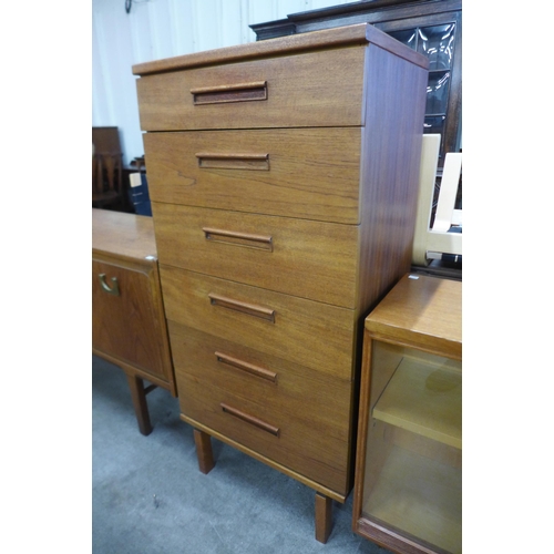 42 - An Austin Suite teak chest of drawers