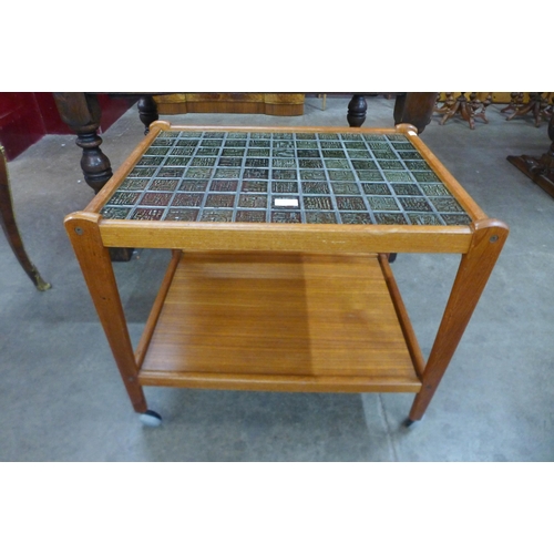 48 - A Danish teak and green tiled topped trolley