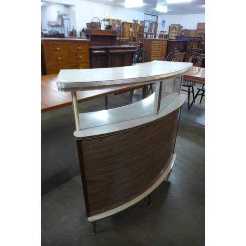 53 - A Formica boat shaped bar