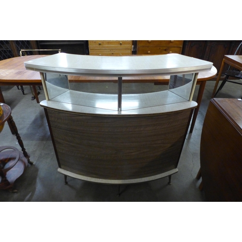 53 - A Formica boat shaped bar