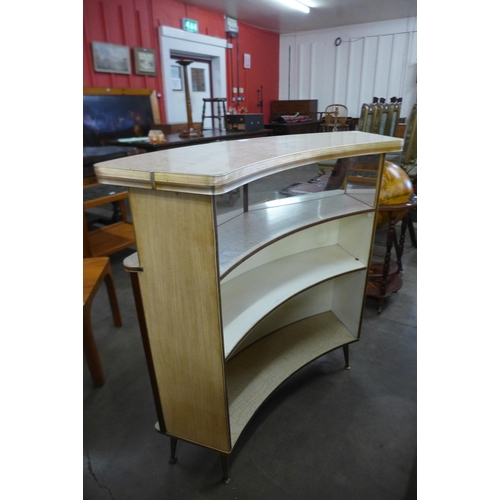 53 - A Formica boat shaped bar