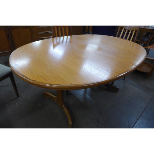 55 - A G-Plan Fresco teak extending dining table and six chairs