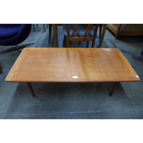 58 - A teak coffee table