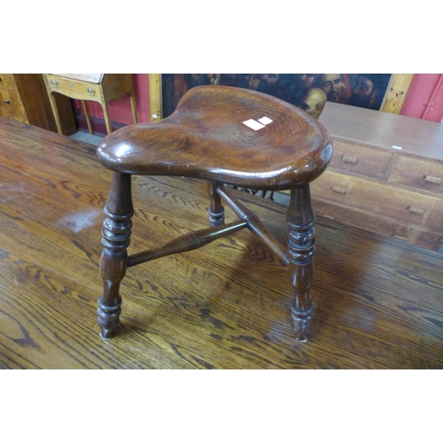 6 - A Victorian style elm saddle seat stool