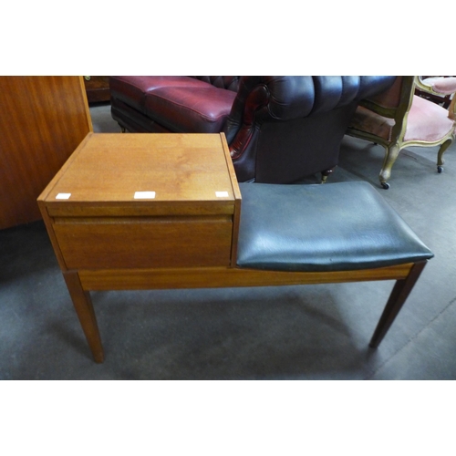 64 - A Chippy Heath teak hall seat