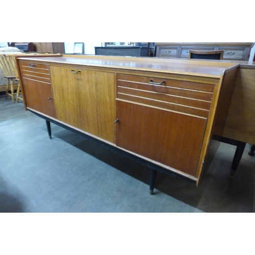 67 - A teak sideboard