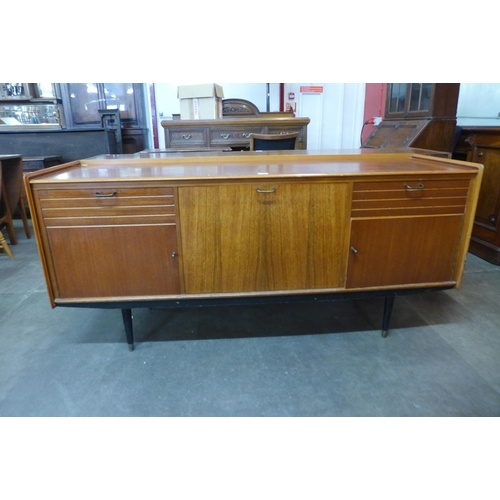 67 - A teak sideboard