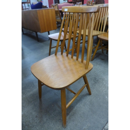 77 - A set of five beech kitchen chairs