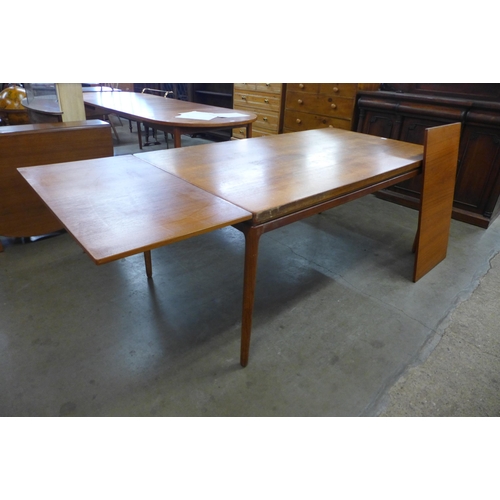 79 - A Danish Christian Linneberg teak extending dining table, Johannes Andersen