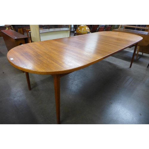 80 - A Swedish Hugo Troeds teak extending dining table, designed by Nils Jonsson