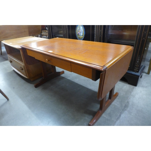 85 - A teak drop-leaf coffee table