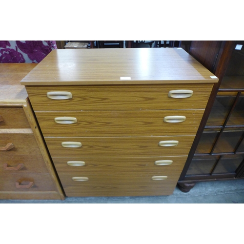 88 - A simulated teak chest of drawers