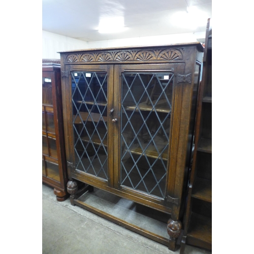 91 - An oak two door bookcase