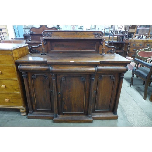 96 - A William IV rosewood breakfront three door sideboard