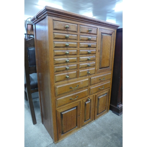 97 - An early 20th Century beech dentist's cabinet, 114cms h, 87cms w, 38cms d