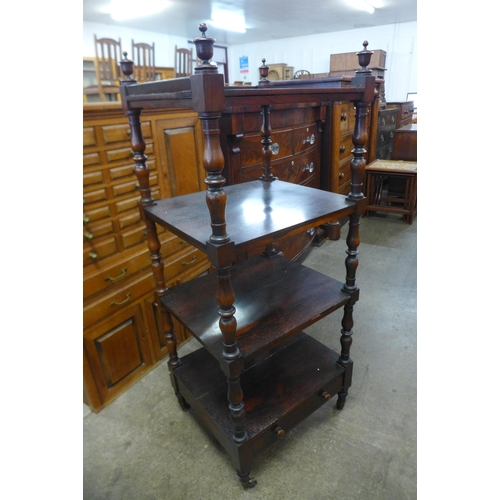 99 - A George IV rosewood four tier whatnot